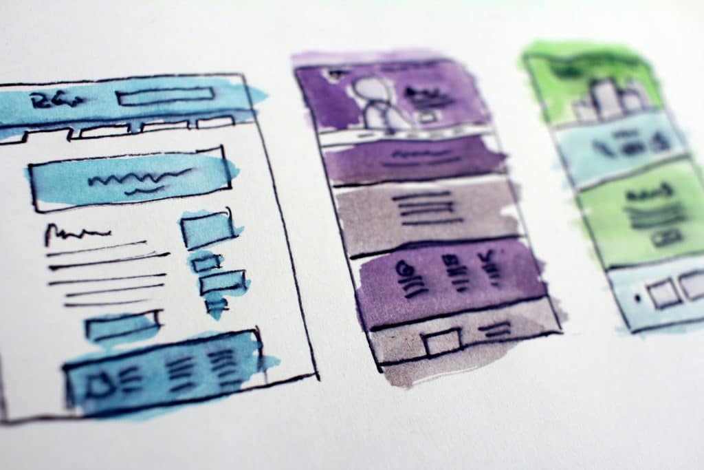 Croquis de maquettes et palette de couleurs joints au cahier des charges d'un site internet